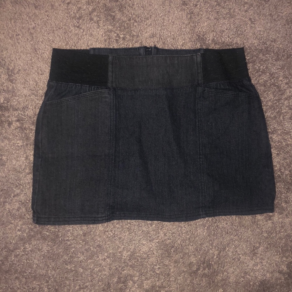 Light dark blue denim skirt with 1 small pocket on each side size medium